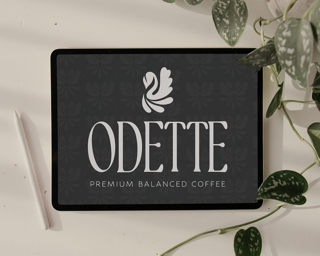 Odette premium coffee brand identity featuring a custom swan logo, elegant typography, and sophisticated branding displayed on a tablet mockup.