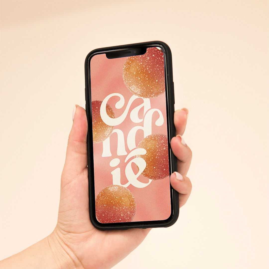 Mobile brand identity mockup for Candie featuring thoughtful typography, playful candy-inspired illustrations, and a strategic visual identity designed to capture the brand's fun personality.