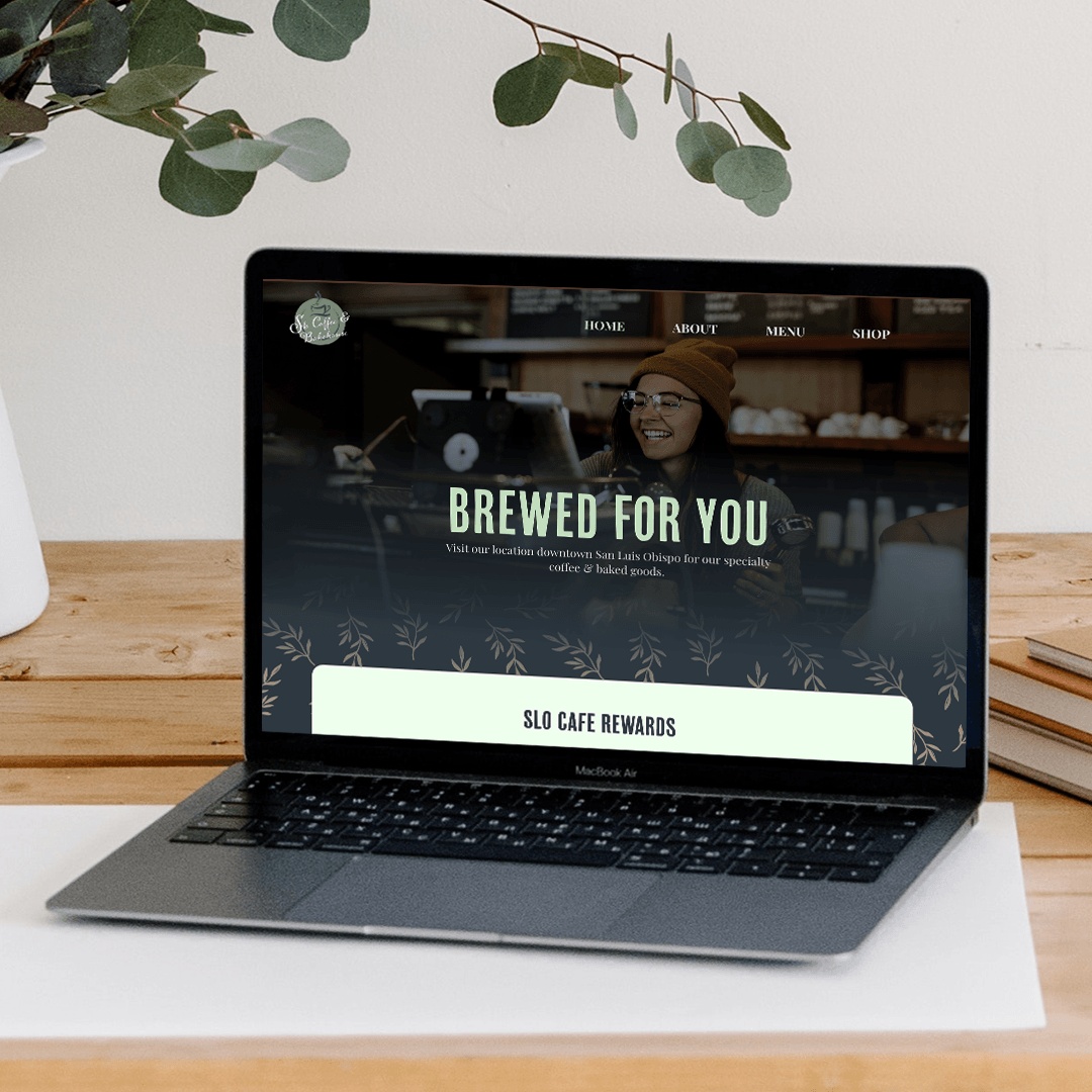 Website design for a modern earthy cafe on laptop.